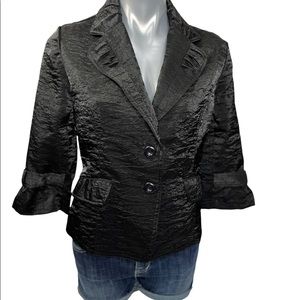 Clara Sun Woo black lustrous jacket.